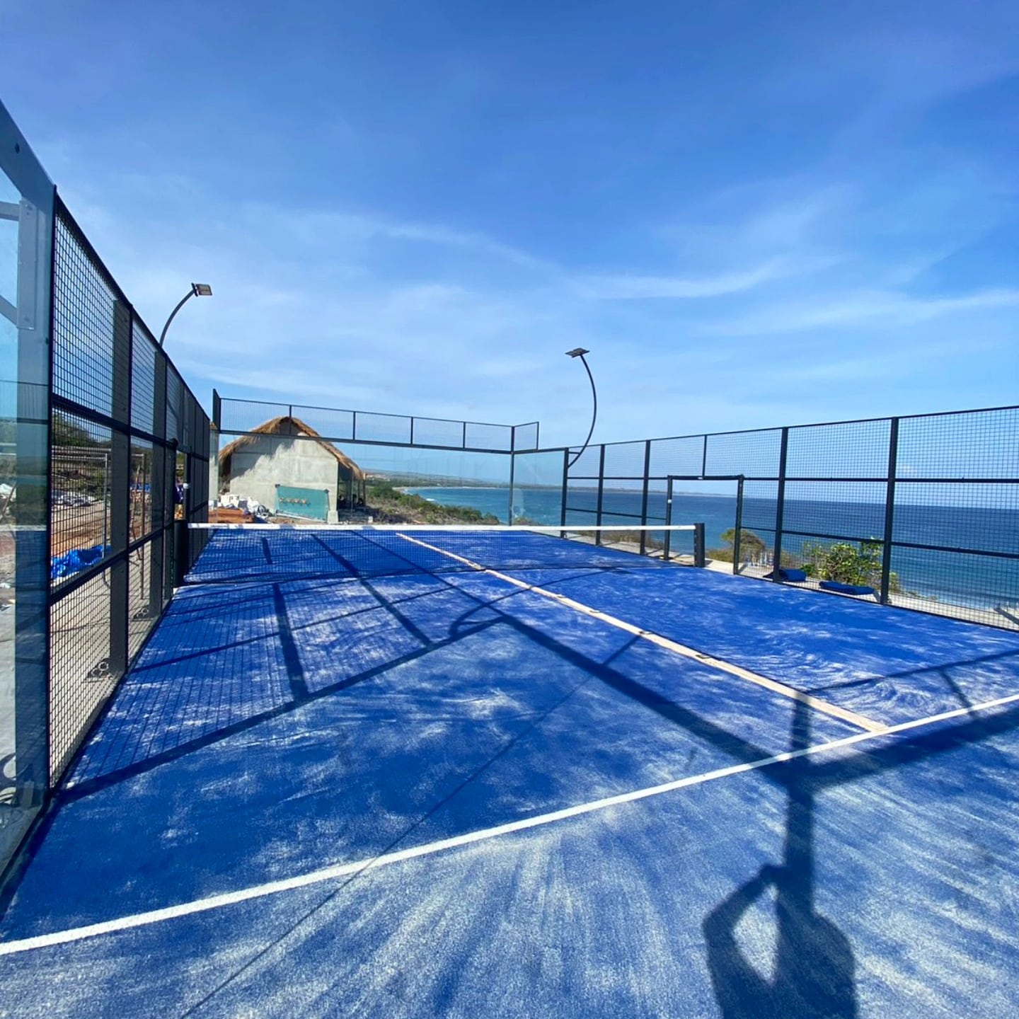 Completed padel court overlooking the ocean at Eco Beach City